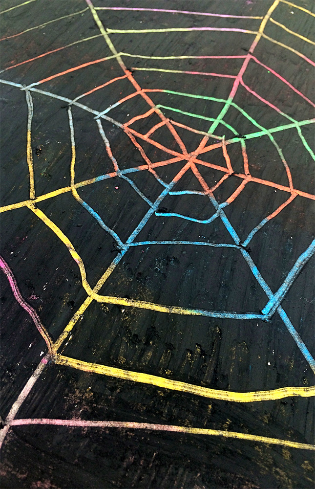 Scratch art spider webs